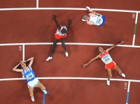 BEIJING- AUGUST 19: (L-R) Christian Obrist of Italy, Belal Mansoor Ali of Bahrain, Andy Baddeley of Great Britain and Rashid Ramsi of Bahrain collapse at the finish line in the Men's 1500M Final during day 11 of the Beijing Summer Olympic Games on August 19, 2008 at the National Stadium in Beijing, China. Ramsi won the gold medal. (Photo by Donald Miralle)