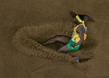 ATHENS - AUGUST 26: James Beckford of Jamaica competes during the men's long jump final on August 26, 2004 during the Athens 2004 Summer Olympic Games at the Olympic Olympic Stadium in the Sports Complex in Athens, Greece. (Photo by Donald Miralle/Getty Images)